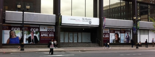 Street view of new McMaster CCE signage at 1 James St. N.